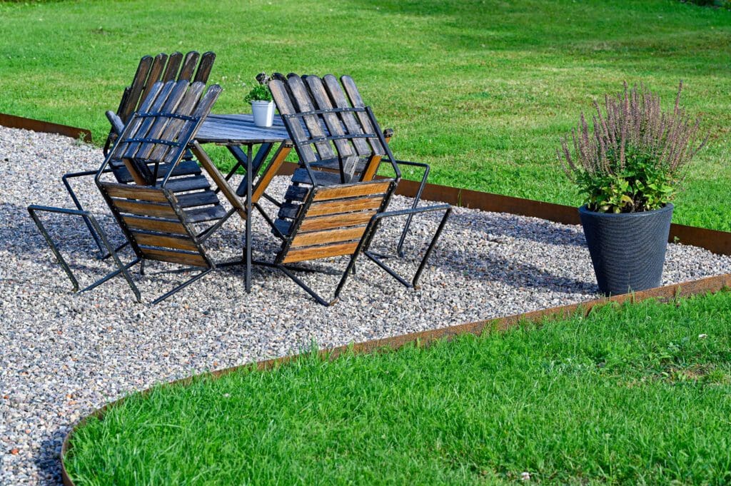 A patio area defined by Corten Steel edging.