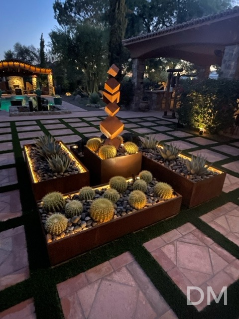 an artistic display of corten steel planters